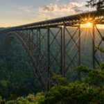 Bridge over river with sunsetting in West Virginia